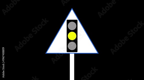 The bottom yellow light is illuminated on this traffic signal while a yellow ready sign is visible on the right side. 4k videos,,,,,,,..