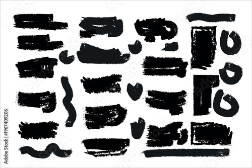 Collection of abstract black brush strokes on a white background