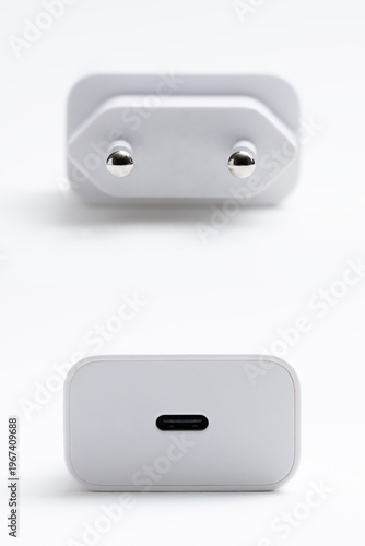 Set of white wall chargers adapter plug isolated on white background, minimal monochrome electronic accessory