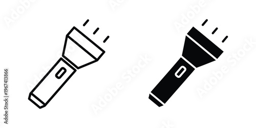 Two flashlights facing opposite directions with light beams shining outward