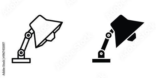 Adjustable desk lamp in two different lighting panel orientations