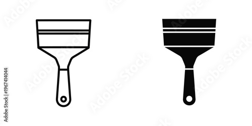 Comparison of a white and black trowel tool used in construction and painting tasks