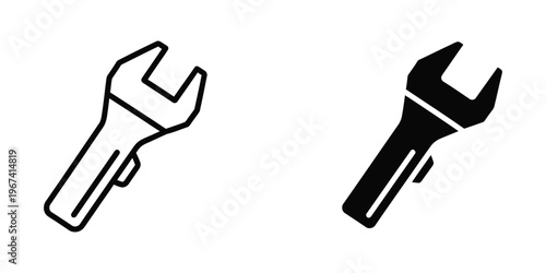 Comparison of a traditional and modern wrench design in black and white contrast