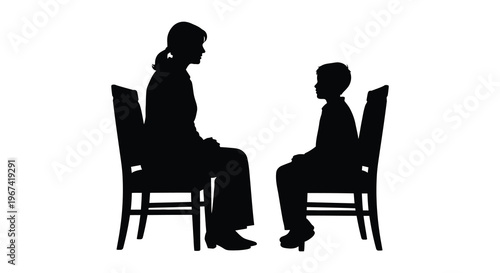 Mother and son in conversation depicted as a striking silhouette