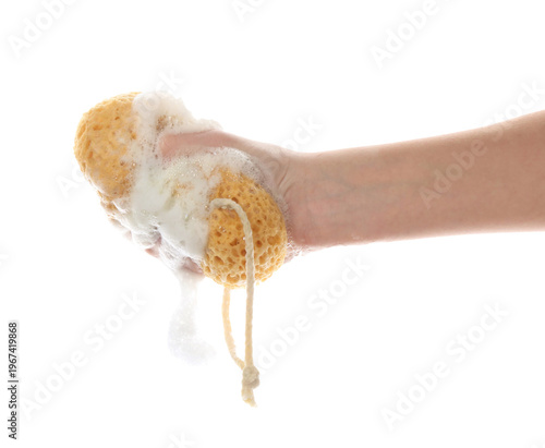 Woman with bath sponge and foam on white background, closeup