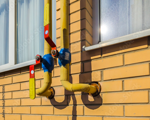Gas pipes entering the kitchen from the outside through the wall