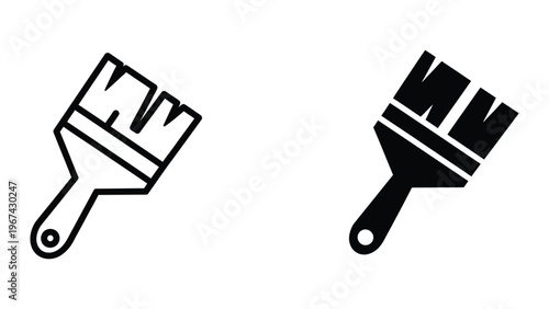 Two contrasting paintbrushes symbolizing different painting styles or techniques