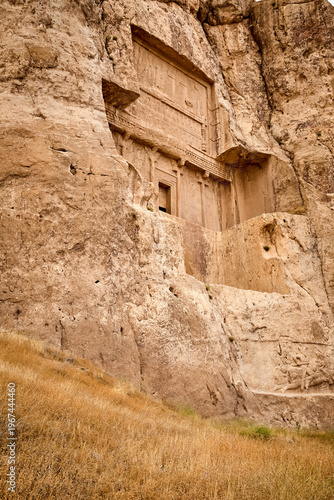 Ancient tomb carved in rock in Naqsh-e Rostam near Persepolis, Iran