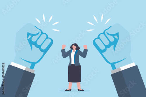 Businesswoman standing between two powerful hands representing strength and ambition