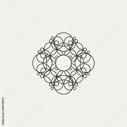 Intricate geometric design featuring overlapping circles and elegant symmetry.