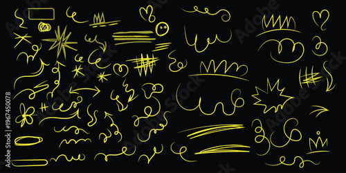 Yellow abstract glowing neon signs on a dark background with various shapes and lines