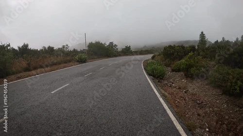 Montes de Leon - LE-142 mountain road through the fog between Manjarin and El Acebo, municipality of Molinaseca, El Bierzo, province of Leon, Spain