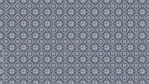Seamless pattern, traditional geometric tribal design featuring intricate diamond shapes and small repeating elements in elegant navy blue, off-white, and muted gray-blue, ideal for