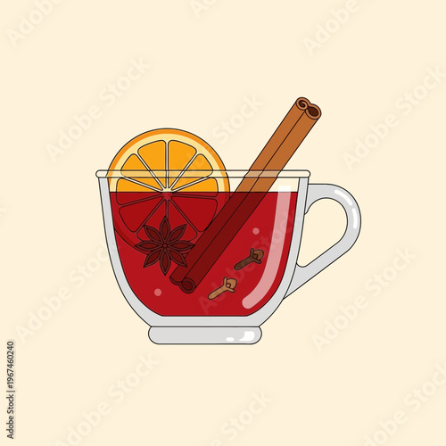 Warm and inviting mulled wine in a transparent glass cup with garnishes.