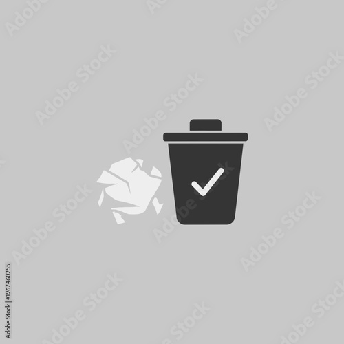 Trash can with a check mark and crumpled paper symbolizing completion and waste.