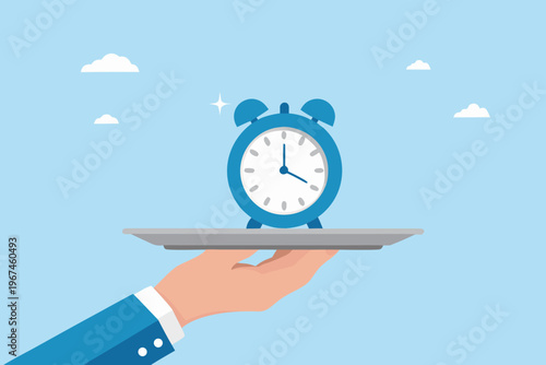 A blue alarm clock served on a silver platter by a hand