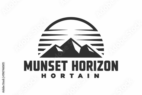 Dusk Landscape with Purple and Orange Mountain Silhouettes and Rolling Hills View