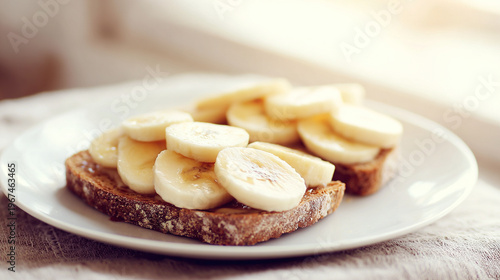 Sliced banana on toast with maple syrup