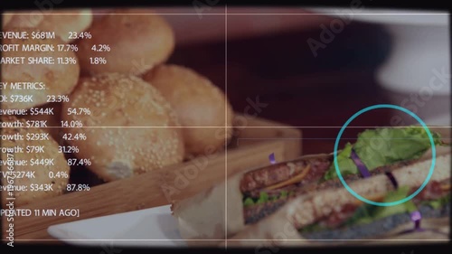 HUD appearing, blue scan ring scanning two sandwich halves, metrics sliding and showing performance