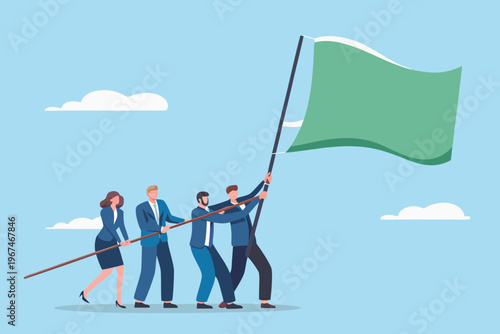A group of businesspeople collaboratively raising a green flag on a pole