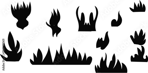 Black silhouette flames in various shapes and sizes on white background