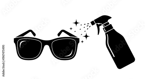 Cleaning sunglasses with a spray bottle for clear vision.