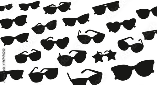 Collection of various black silhouette sunglasses on a white background, showcasing different styles and shapes of eyewear.