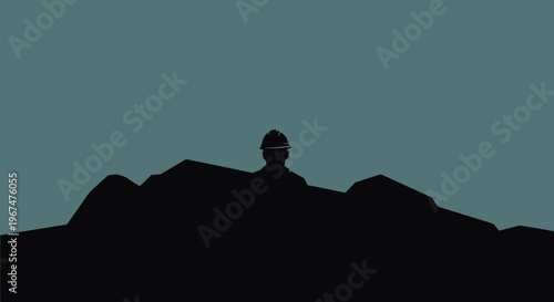 Silhouette of a person wearing a hard hat against a muted background.