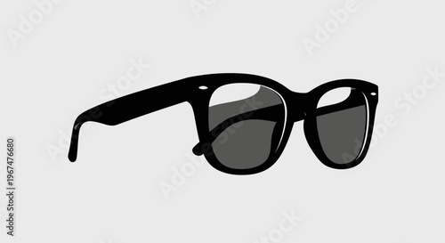 Stylish Black Sunglasses with Dark Lenses on a Clean Background.