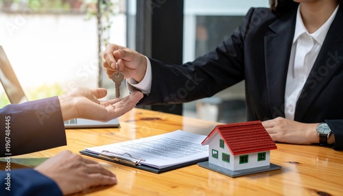 Handing Over House Keys Over Contract and Small House Model