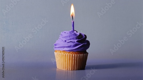 Cupcake With Purple Frosting and Candle on a Plain Background