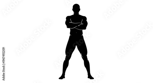 Strong male silhouette standing with arms crossed.