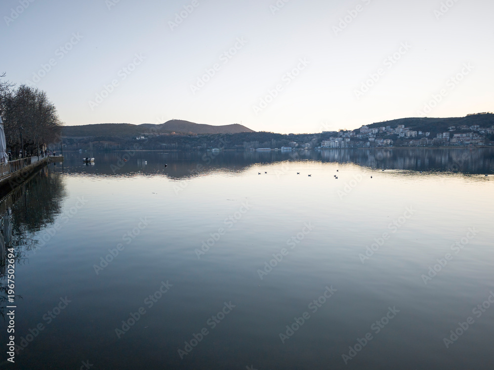 Fototapeta premium Panorama of Lake Orestiada around town of Kastoria, Greece