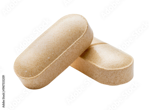 Fotografie Isolated pair of beige speckled oblong dietary supplement pills for daily health and wellness