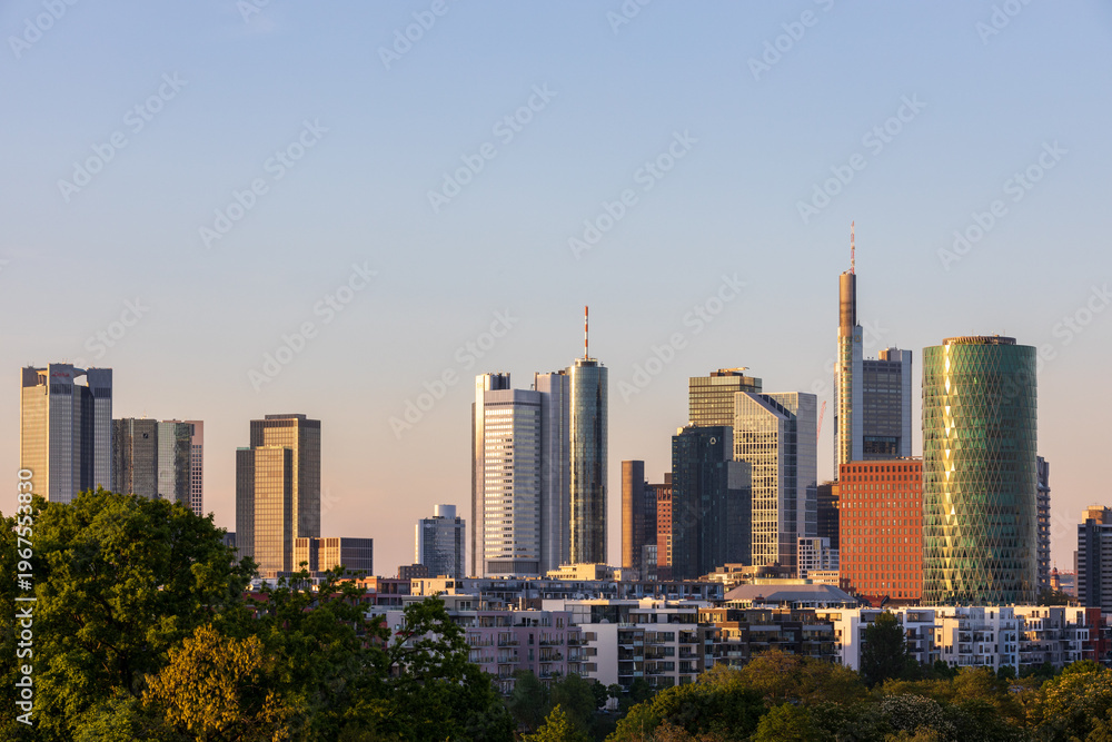 Fototapeta premium Frankfurt am Main skyline with modern skyscrapers and residential buildings at sunset, Niederrad, Hessen, Germany