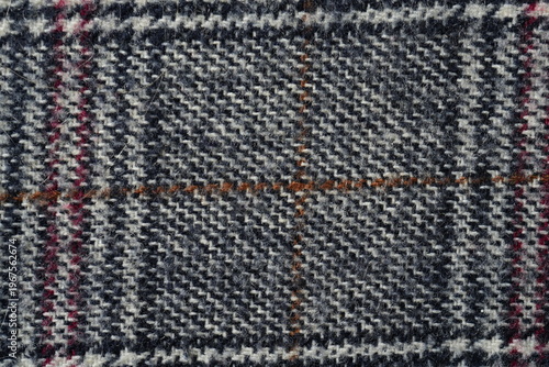 Photos macro texture of plaid fabric with classic tweed pattern