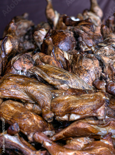Fresh smoked chicken thighs are on display at the fair.