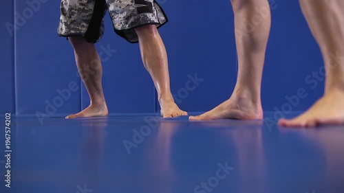 Close up of fighters feet training