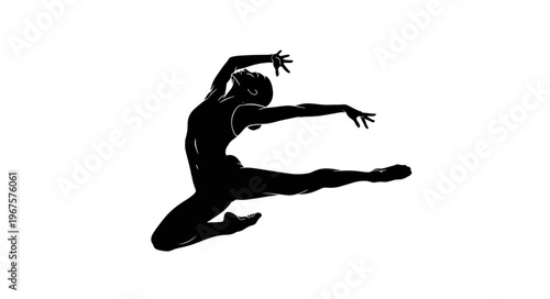 Silhouette of a graceful female ballet dancer in mid-air leap.
