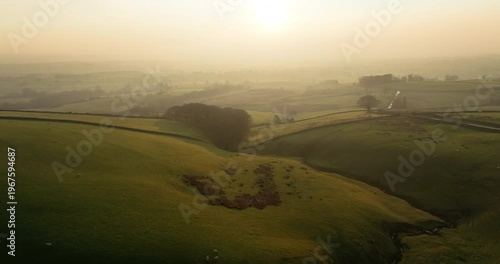 Sunset over green countryside in north England