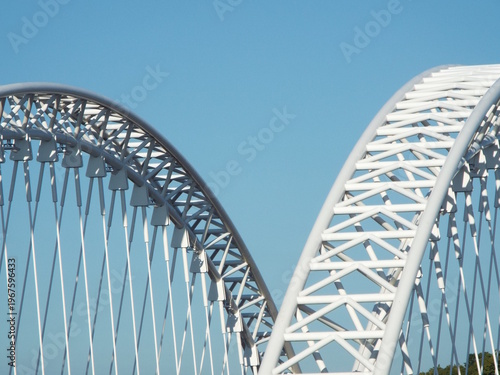 Photography The white arches and suspension cables of the Vimy Memorial Bridge stand prominently against a clear blue sky