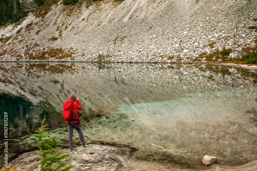 Mount Rainier and mountain lake with forest reflection. Mount Rainier National Park, Washington State, USA.