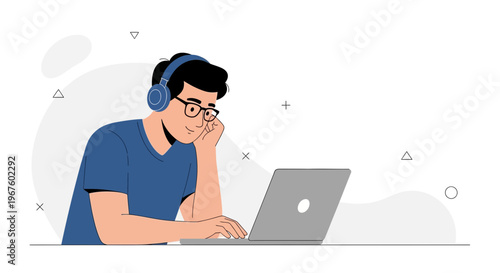 Young man with headphones and glasses working on a laptop, focused on online learning or remote work.