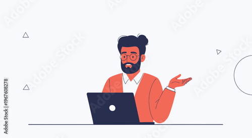 Man with beard and bun hairstyle sitting at desk with laptop, gesturing confusion