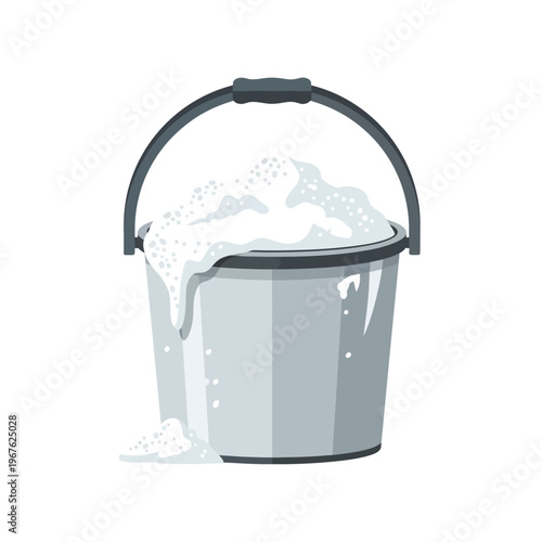 A grey bucket overflowing with white soapy foam, with suds spilling down the side