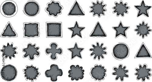 A collection of various gray metal cookie cutters on a white background