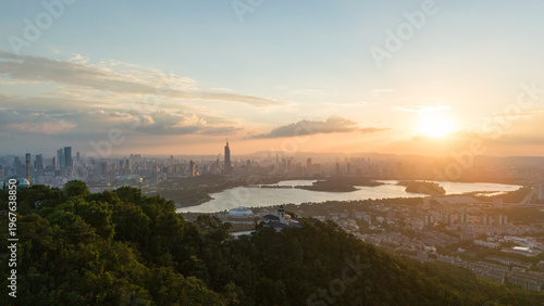 Aerial view of modern city at sunset