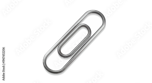 Metal Paperclip Attached to White Background