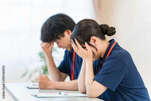 Slika na platnu Caregivers and male and female staff in the caregiving profession are struggling with fatigue and overwork