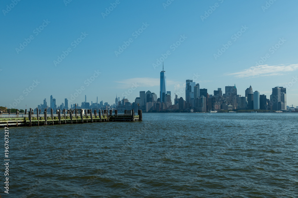 Naklejka premium Lower Manhattan Skyline and One World Trade Center from the Hudson River